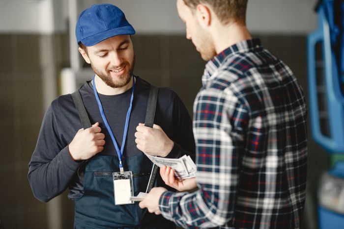 Automotive customer paying at a card terminal